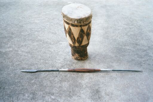 Drum from Cape Town, Masai spear from Kenya 